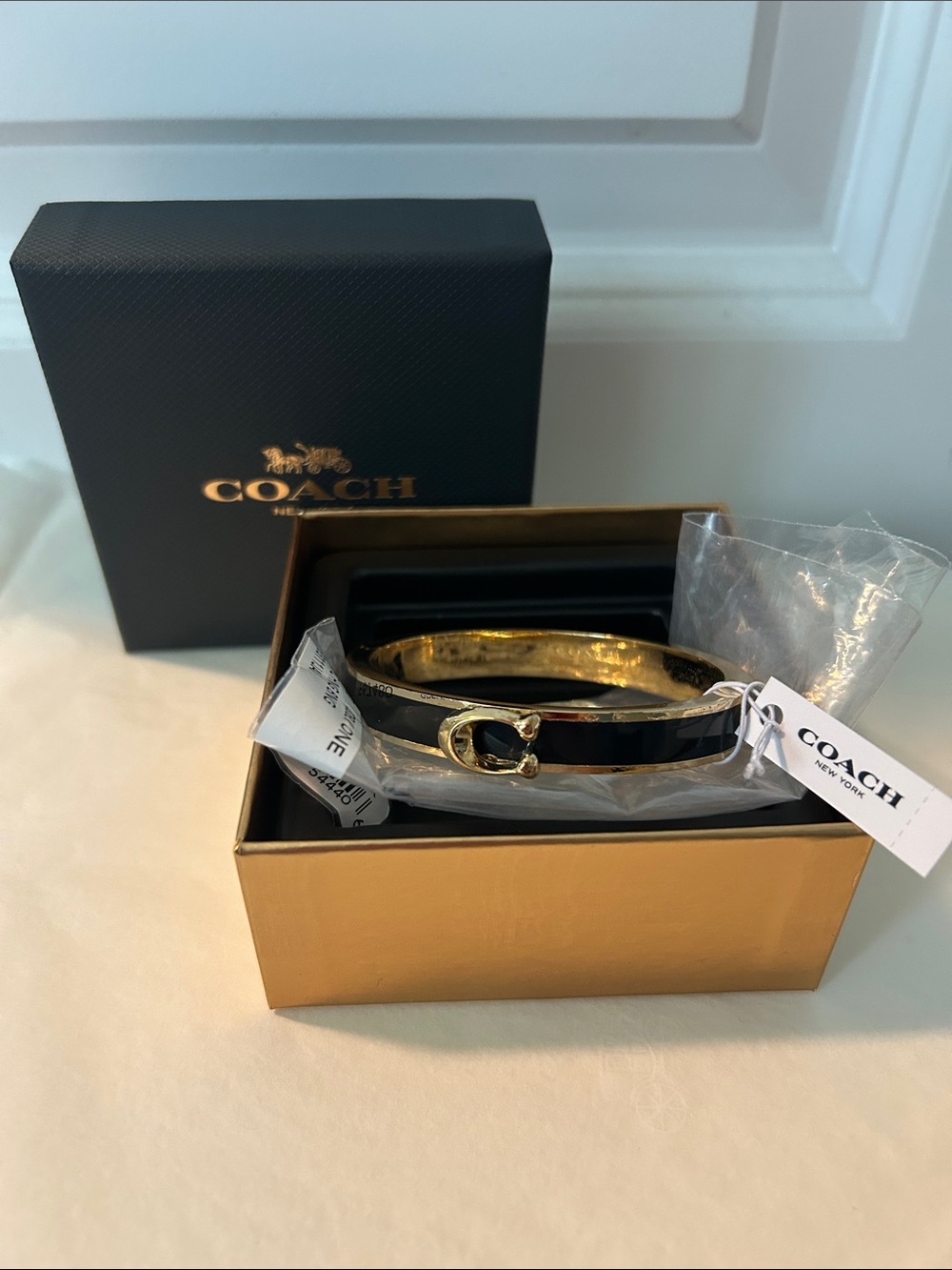 Coach Black and Gold Enamel Hinged Bangle